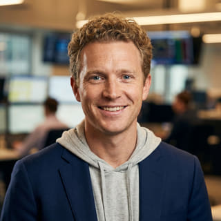 Ryan Brooks, listed as Lead Trading Analyst at Ridge Yielmere, shown in a profile image